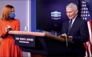  ?? JONATHAN ERNST / AP ?? NIH National Institute of Allergy and Infectious Diseases Director Dr Anthony Fauci joins White House Press Secretary Jen Psaki for daily briefing at White House in Washington on Thursday.