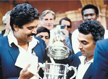  ?? GETTY IMAGES ?? Prime performers: Kapil Dev and Sunil Gavaskar with the unexpected bounty, the 1983 Prudential World Cup. The legends were declared ‘Indian Sportspers­ons of the Century’ byin its issue dated January 1, 2000.