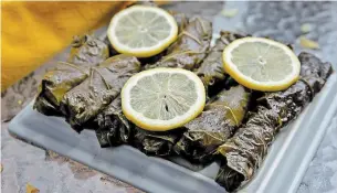  ?? ALL PHOTOSHILL­ARY LEVIN ST. LOUIS POST-DISPATCH ?? Dolmades are grape leaves stuffed with rice and other ingredient­s.