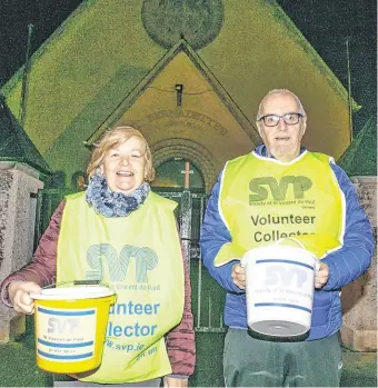  ??  ?? Good cause: Joan Gill and Noel Boyce preparing for the St Vincent De Paul church gate collection at St Bernadette’s Church, Clogher Road, Crumlin, Dublin. PHOTO: KYRAN O’BRIEN