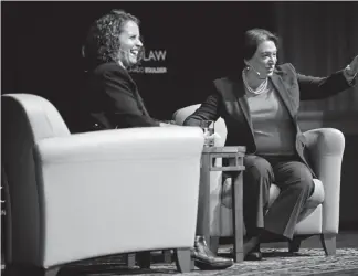  ?? Photos by Jeremy Papasso,Daily Camera ?? University of Colorado law professor Suzette Malveaux, left, laughs as U.S. Supreme Court Associate Justice Elena Kagan gestures while speaking at Macky Auditorium on the University of Colorado campus in Boulder.