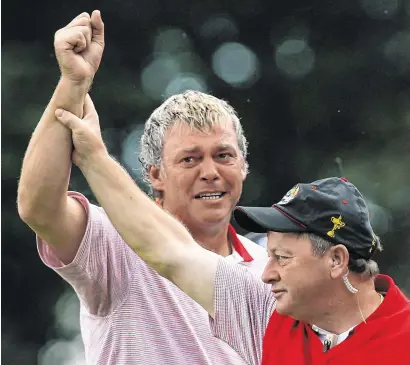  ?? GETTY ?? An emotional Darren Clarke celebrates with captain Ian Woosnam on the 16th at the K Club after Europe’s 2006 win