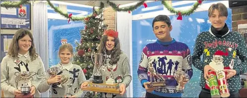  ?? ?? Canterbury Golf Club’s junior trophy winners from left, sisters Claudia, Christina and Georgina Carlotti, Matthew Jones and Amos Brazier