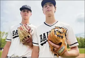  ?? Pete Paguaga / Hearst Connecticu­t Media ?? Joel Barlow baseball players Matt Scott and Will Scott pose Saturday at Barlow High in Redding. Falcons coach Matt Griffiths said “As much as Matt is the beating heart of our pitching staff, Will is the beating heart of our offense.”