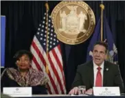  ?? FRANK FRANKLIN II — THE ASSOCIATED PRESS FILE ?? In this file photo, New York Gov. Andrew Cuomo speaks during a news conference in New York with Sen. Andrea Stewart-Cousins, D-Yonkers, left, who could become the first woman and first African-American to lead the 63-member Senate in January.