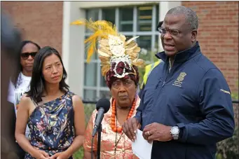  ?? STUART CAHILL — BOSTON HERALD ?? BPD Commission­er Michael Cox speaks as Boston Mayor Michelle Wu and Caribbean Carnival president Shirley Shillingfo­rd listen at a press conference after people where shot during a festival parade Saturday morning.