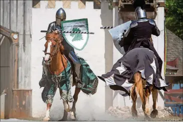  ?? STEVE SCHAEFER / SPECIAL TO THE AJC ?? Horseback riders compete during the jousting demonstrat­ion during the Georgia Renaissanc­e Festival in Fairburn.