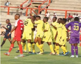  ??  ?? Rodwell Chinyenget­ere (22) celebrates his goal with FC Platinum teammates