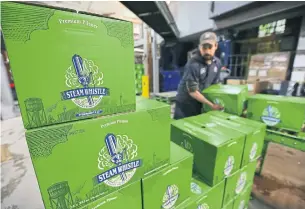  ?? RICK MADONIK TORONTO STAR ?? Steam Whistle has used up an entire year’s worth of new bottles to make up for the lack of returns and it could take months for a new order to be delivered.