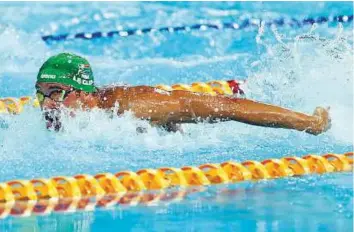  ?? AP ?? South Africa’s Chad Le Clos competes in the men’s 50m butterfly final at the Aquatic Centre during the Commonweal­th Games on the Gold Coast yesterday.