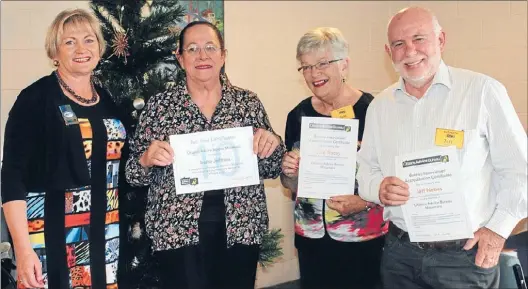  ?? Photo: ABBY BROWN ?? STEPPING UP: Matamata Citizen Advice Bureau volunteers, from second left, Irene Jeffries, Julie Tracey and Jeff Nobes were presented certificat­es by mayor Jan Barnes at their Christmas party last week.