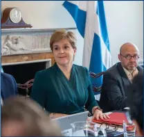  ?? ?? Keith Anderson presented his energy prices safety net plan – which would be underwritt­en by taxpayers’ funds and would have to be paid back through bills – as he attended a special summit with First Minister Nicola Sturgeon