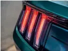  ??  ?? Bold brake light bars are a Mustang design cue, but on this generation of car, they provide a multi-coloured light show and also sweep laterally when your turn indicator is activated.