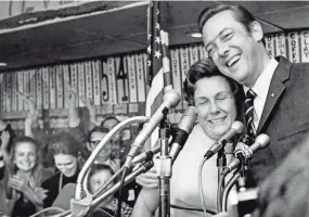  ?? FRANK EMPSON/THE TENNESSEAN ?? Rep. Bill Brock, right, and his wife share a victory hug before a shouting crowd of supporters at Brock for Senate headquarte­rs at the King of the Road Inn Nov. 3, 1970, after he unseated Sen. Albert Gore.