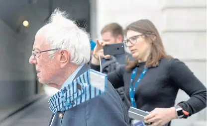  ?? /Reuters ?? Old-timer:
Democratic presidenti­al hopeful senator Bernie Sanders leaves Capitol Hill in Washington after a senate vote on the response to coronaviru­s pandemic.