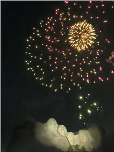  ?? ALEX BRANDON - THE ASSOCIATED PRESS ?? Fireworks light the sky over the Mount Rushmore National Monument Friday, July 3, in Keystone, S.D., after President Donald Trump spoke.