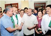  ?? PTI ?? Karnataka Chief Minister H D Kumaraswam­y and his deputy G Parameshwa­ra before a meeting with the farmers on the issue of loan waiver, in Bengaluru on Wednesday