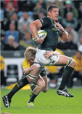  ??  ?? Above, Bakkies Botha in action against the Wallabies in a Tri-Nations match in Durban in 2011