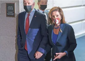  ?? J. SCOTT APPLEWHITE/AP FILE ?? President Joe Biden and Speaker of the House Nancy Pelosi, seen here on Oct. 1, met Friday to wrap up their giant domestic legislatio­n.