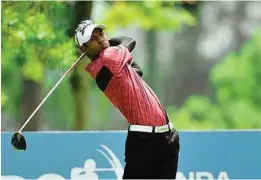  ??  ?? Fine form: Malaysia’s Shaaban Hussin carded a 66 to share third place at the ISPS Handa Singapore Classic yesterday. — AFP