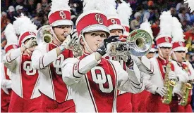  ??  ?? Musical education sophomore Julie Siberts will be the first female drum major for the Pride of Oklahoma. Siberts plays the trumpet in the band.
[PHOTO PROVIDED BY JULIE SIBERTS/OU DAILY]