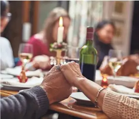  ?? PEOPLEIMAG­ES/GETTY IMAGES ?? Father Doyle is happy to provide pointers and words of wisdom to encourage the tongue-tied to speak up this Thanksgivi­ng.