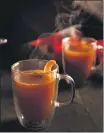  ?? LIZ CLAYMAN FOR THE NEWYORK TIMES ?? Mulled apple cider cocktails are a perfect fall drink.