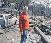  ?? BRIAN VAN DER BRUG Los Angeles Times ?? JOHN PASCOE in 2017 surveys the remains of his Santa Rosa home, destroyed in the Tubbs fire. “I’m still rememberin­g … the stuff I lost,” he said Friday.