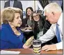  ?? AP/J. SCOTT APPLEWHITE ?? Rep. Louise Slaughter, D-N.Y., confers with House Rules Committee Chairman Pete Sessions on Wednesday about procedural correction­s made to the tax bill. “We are five days away from Christmas, but it feels like Groundhog Day,” Slaughter said in...