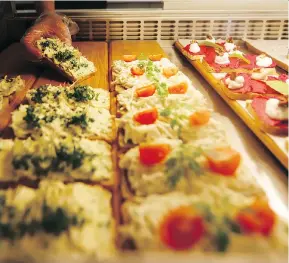  ?? PETR DAVID JOSEK/THE ASSOCIATED PRESS ?? Hana Michopulu’s bistro, Sisters, in Prague, Czech Republic, features a menu of the country’s famed open-faced sandwiches. “It’s all about the flavour that has to be as rich, full and complex as possible,” says Michopulu.