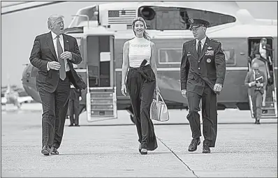  ?? The New York Times/DOUG MILLS ?? President Donald Trump and his daughter Ivanka leave Marine One as they prepare to board Air Force One for a flight to a jobs event Tuesday in Wisconsin.