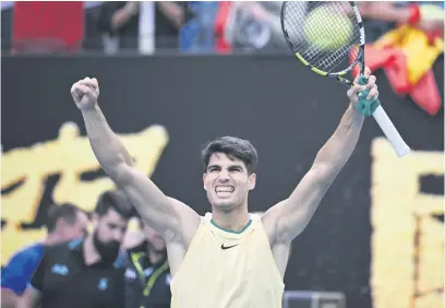  ?? Picture: AFP ?? MARCHING ON. Spain’s Carlos Alcaraz celebrates after beating Italy’s Lorenzo Sonego in the second round of the Australian Open in Melbourne yesterday.