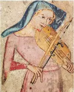  ??  ?? UNA DONNA SUONA UNA VIOLA NELL’AFFRESCO LA PASSIONEDI­CRISTO. 1335. MUSEO DE NAVARRA, PAMPLONA.