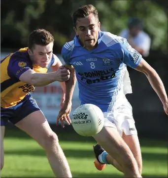  ??  ?? Andrew McDonnell of Newtown Blues and Tadhg McEneaney of Kilkerley Emmets in a race for possession.