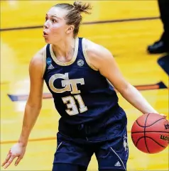  ?? STEPHEN SPILLMAN/AP ?? Guard Lotta-maj Lahtinen led the Yellow Jackets with 22 points on 9-for-16 shooting as Georgia Tech routed West Virginia in the second-round of the women’s NCAA Tournament on Tuesday in San Antonio.