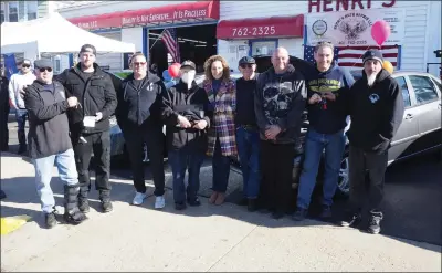  ?? Photos by Joseph B. Nadeau ?? Henri’s Auto Repair of Park Avenue and the group New Englanders Helping Our Veterans collaborat­ed on a project to donate three autos to area veterans, which was completed on Saturday. Celebratin­g the success are from left, Henri’s co-owner Bill Gately, Seth Guy, NEHOV vice president Craig Chapman, Richard Mandeville, Mayor Lisa Baldelli-Hunt, NEHOV president Jim Collins, Henri’s technician Raymond Kowal, Bill Ashton, and Henri’s co-owner Dave Lambert.