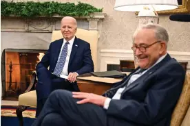  ?? Joe Biden and Chuck Schumer in the Oval Office on Tuesday. Photograph: Jim Watson/ AFP/Getty Images ??