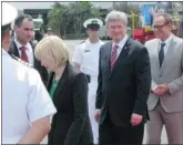  ?? Postmedia News ?? Prime Minister Stephen Harper and his wife Laureen arrive in Cartagena, Colombia on Friday to attend the Summit of the Americas.