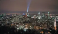  ?? CP FILE PHOTO ?? The downtown skyline of Montreal is seen on Feb. 18, 2015. Montreal city council passed a motion on Monday making it the latest Canadian jurisdicti­on to declare itself a sanctuary city.