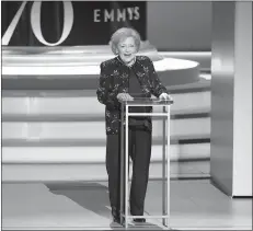  ?? Kevin Winter / Getty Images /TNS ?? Betty White speaks onstage during the 70th Emmy Awards at Microsoft Theater on Sept. 17, 2018, in Los Angeles.