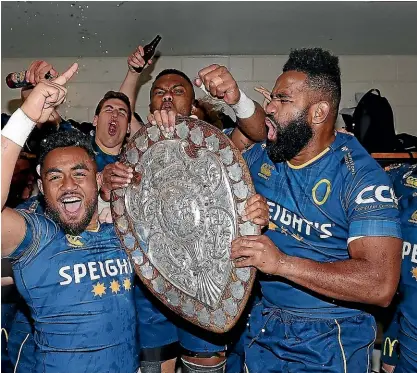  ?? GETTY IMAGES ?? Otago players celebrate their Ranfurly Shield triumph over Waikato in Hamilton. The two teams meet again tonight in the Championsh­ip final.