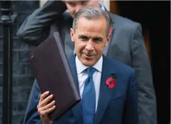  ?? DOMINIC LIPINSKI/THE ASSOCIATED PRESS ?? Mark Carney has extended his stay one year until U.K.-EU negotiatio­ns conclude in 2019.