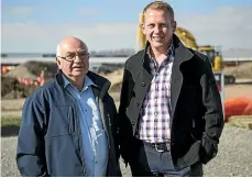  ?? GEORGE HEARD/STUFF ?? Knights Stream School chair Warren Read, left, and principal Mike Molloy at the site of the Halswell school, set to open next year.