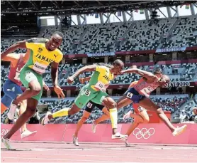  ?? Picture: MATTHIAS HANGST/GETTY IMAGES ?? END GAME: Jamaica’s Hansle Parchment stretches over the line to win gold in the men's 110m hurdles final in the Tokyo 2020 Olympic Games at Olympic Stadium yesterday