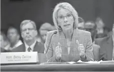  ?? WIN MCNAMEE, GETTY IMAGES ?? “It’s time for a regulatory reset,” says Education Secretary Betsy DeVos, shown testifying before the Senate this year.