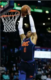  ?? ASSOCIATED PRESS ?? OKLAHOMA CITY THUNDER’S RUSSELL WESTBROOK dunks the ball in the third quarter in Oklahoma City on Monday. Oklahoma City won, 112-107.