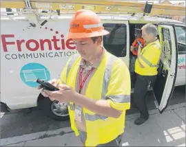  ?? Luis Sinco Los Angeles Times ?? FRONTIER LOST $373 million last year and $75 million more in the first quarter of 2017. Above, technician­s Airik Morales, left, and Jason Raine last year.