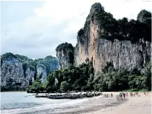  ?? | The Washington Post ?? Long-tail boats lined up along Railay Beach in Thailand.