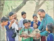  ??  ?? Birders have been training children from the local Mangar Bani government school about birding. ANUSHREE FADNAVIS/HT PHOTO