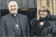  ??  ?? CHURCH COUPLE: The soon-to-be Archbishop of York Stephen Cottrell with his wife Rebecca, outside York Minster.